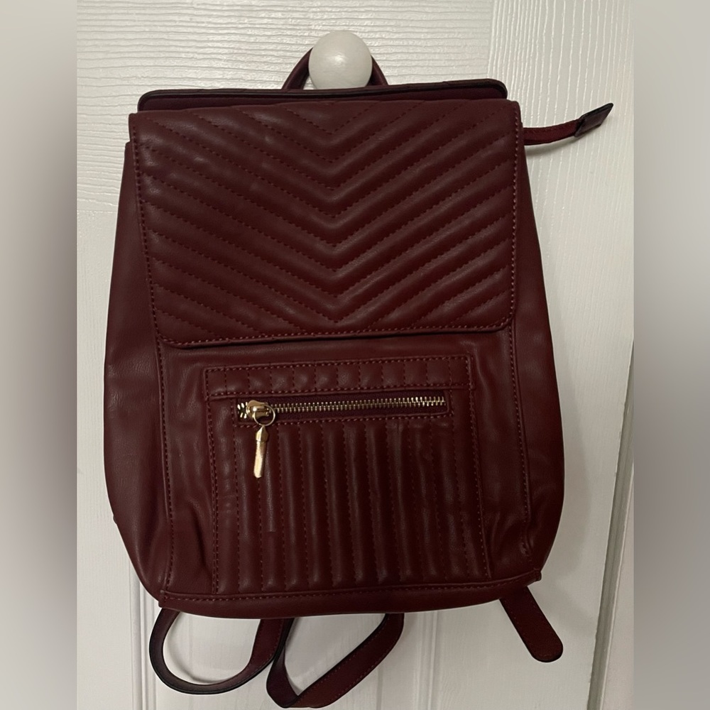 Steve Madden burgundy mini backpack. NWOT. Never used.